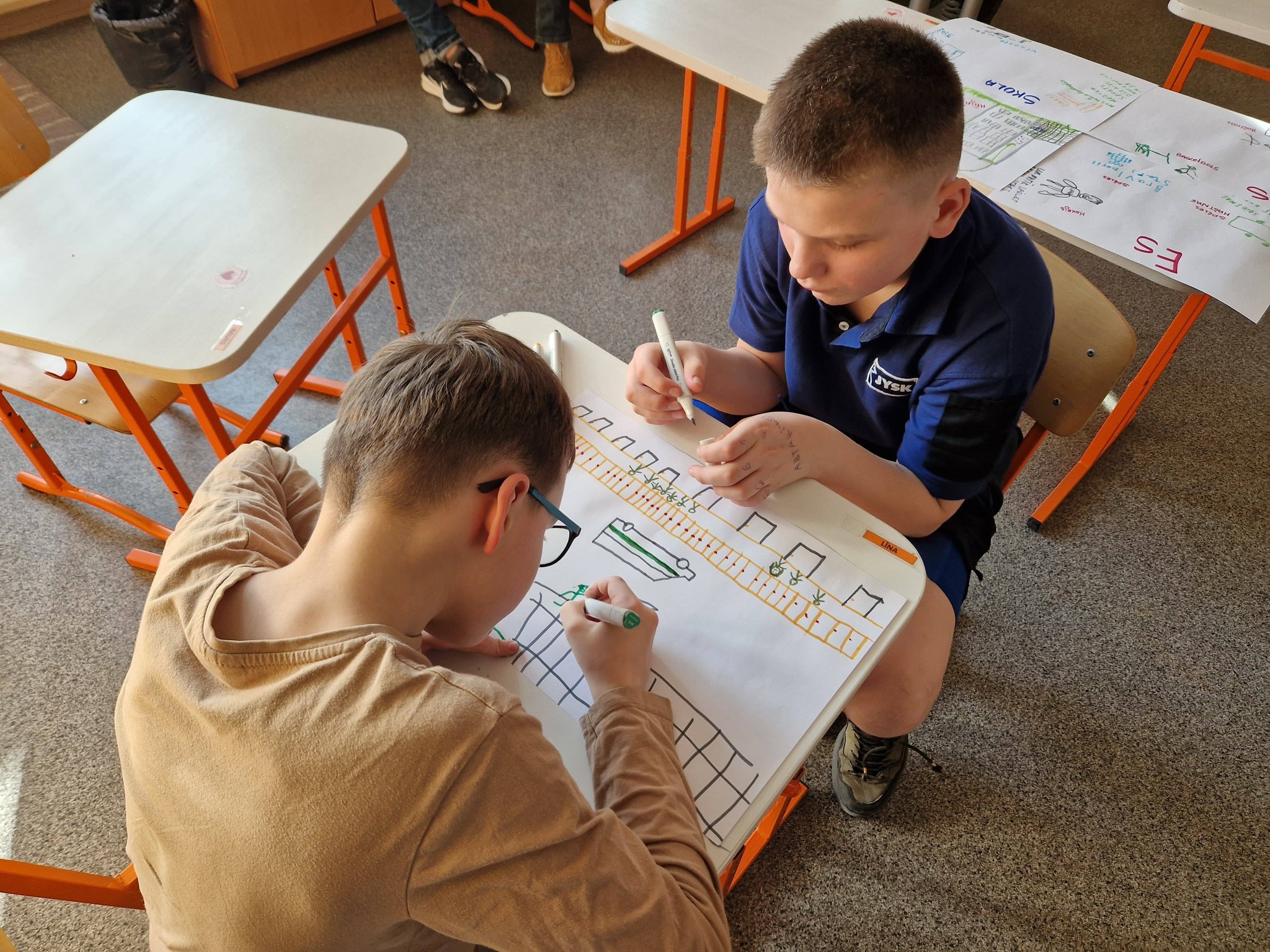 May be an image of studying and text