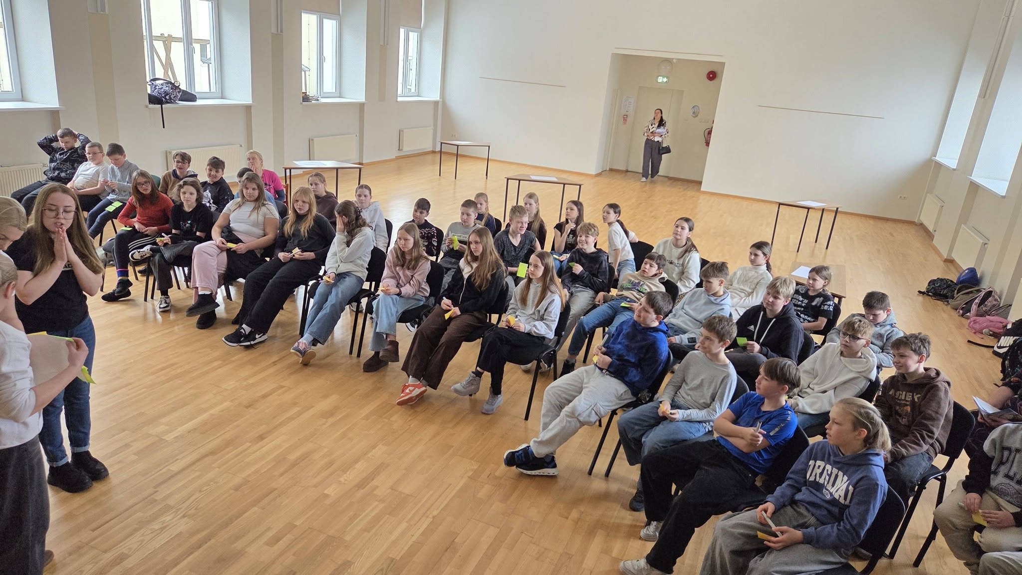 May be an image of violin and crowd