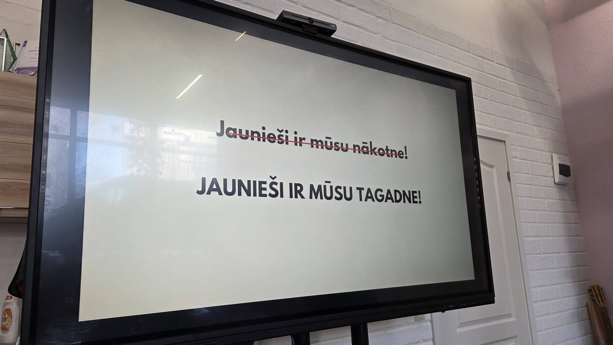May be an image of television and text